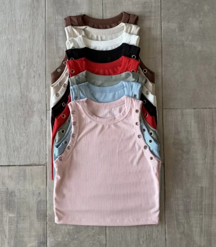 Musculosa larga con ojalillos